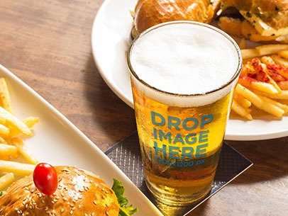 Mockup of a Glass of Beer at a Restaurant Table