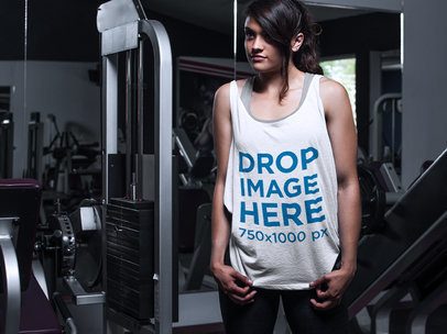Sleeveless Shirt Mockup of a Woman Working Out at the Gym