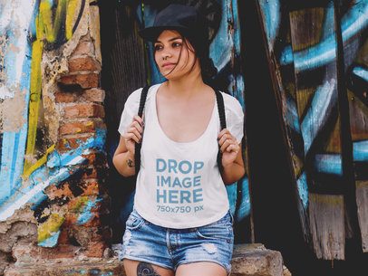 T-Shirt Mockup Template of a Hip Woman at an Urban Environment