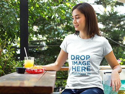 Girl Having Lunch at a Local Cafe T-Shirt Mockup a8614