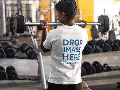 T-Shirt Mockup Featuring Man at the Gym Lifting Weights  a8167
