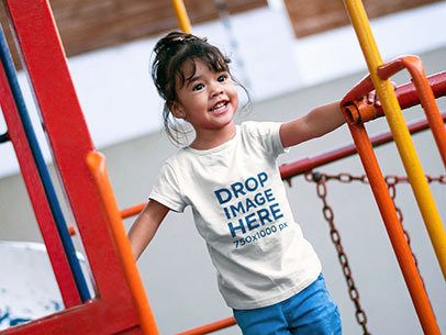 Little Girl Having Fun at a Playground T-Shirt Mockup