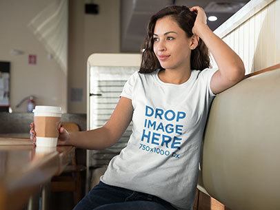 Woman at a Diner Enjoying a Coffee T-Shirt Mockup