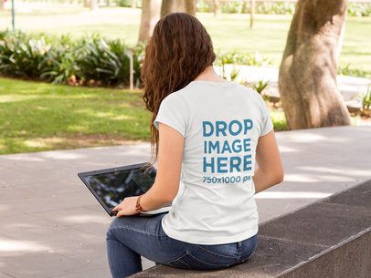 Girl at a Campus Working while Wearing a Round Neck Tee Mockup from the Back a9182b