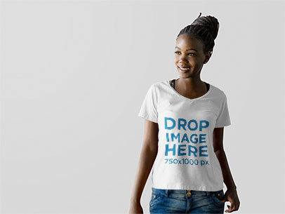 T-shirt Mockup of a Woman at a Photo Studio 