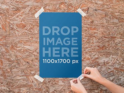 Poster Mockup Pasted to a Wooden Wall