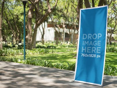 Vertical Banner Mockup at a University Courtyard 