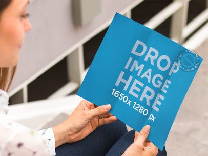 Brochure Mockup Featuring a Woman Sitting on a Stairway a10320