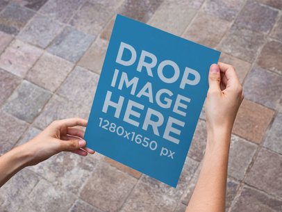 Flyer Mockup Featuring a Guy Walking in the Street