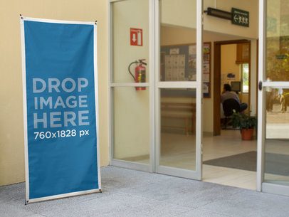 Vertical Banner Mockup Outside a Teacher's Lounge a10389