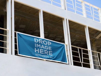 Horizontal Banner Mockup Hanging From a Balcony in a Stadium