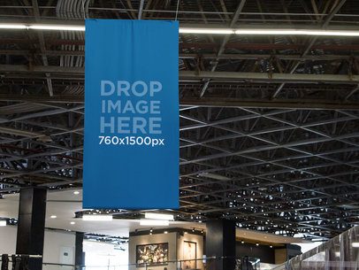 Vertical Banner Mockup Hanging From the Ceiling at an Airport a10694