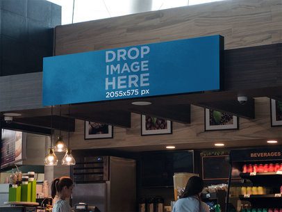 Horizontal Banner Mockup at a Coffee Stand in an Airport