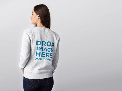 Back of a Woman Wearing a Crewneck Sweater Mockup Against a Transparent Backdrop