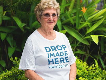 T-Shirt Mockup of an Elder Woman in her Front Yard