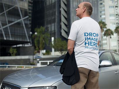 Back of a Senior Man Wearing a T-Shirt Mockup in the City