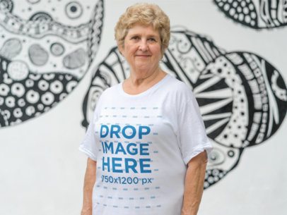 Senior White Woman Wearing a T-Shirt in an Urban Space