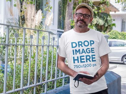 T-Shirt Mockup of a Middle-Aged Hipster Man Outdoors