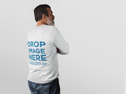 Elder Man Facing a Transparent Backdrop Wearing a Long Sleeve Tee Mockup