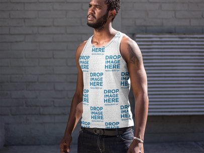 Sublimated Men's Heathered Tank Top Mockup Featuring a Muscular Young Man