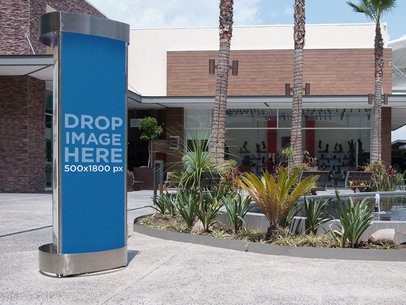 Mockup of a Vertical Banner Placed Outside a Mall