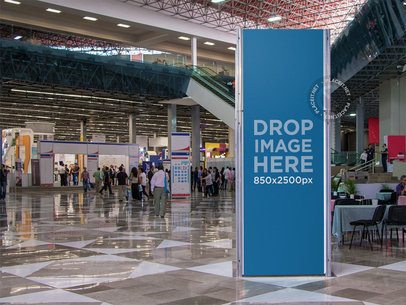 Mockup of a Vertical Banner Inside a Convention Center