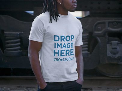 Tshirt Mockup of a Man with Locs at Urban Setting
