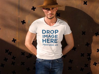 Tshirt Mockup of a Man Wearing Blue Jeans and a Hat