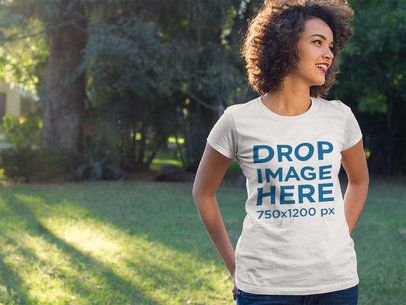 Apparel Mockup of a Young Woman Wearing a T-Shirt