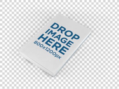 Paperback Book Mockup Lying on a Surface Over a Transparent Background