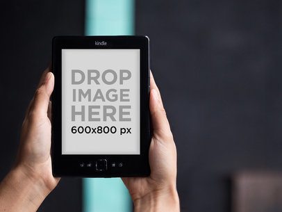 Kindle Mockup Held With Both Hands by a Man 