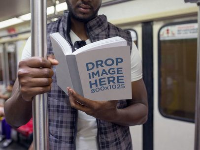 Book Mockup Featuring a Man Reading on the Metro a12036