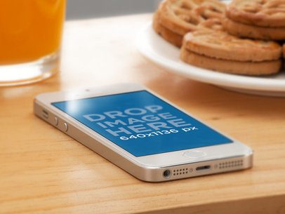 White iPhone SE Mockup at Breakfast a12252
