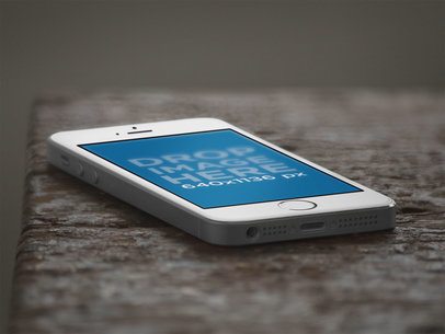 iPhone SE Mockup Lying Over a Wood Texture a12258