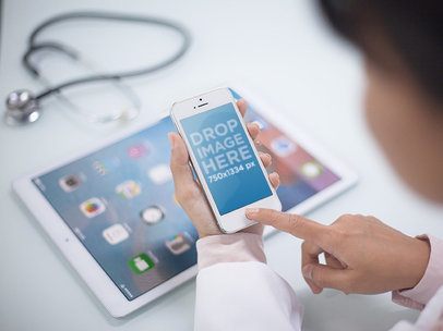iPhone Mockup of a Doctor Using a White iPhone 6