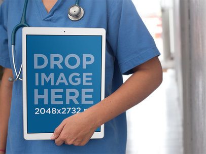 iPad Pro Health Mockup Featuring a Medical Assistant Holding an iPad