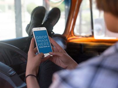 iPhone Mockup in Portrait Position of a Man Texting in a Car