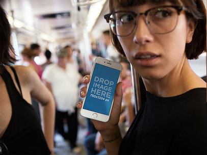 iPhone 6s in Portrait Position Mockup Featuring a Young Woman Riding the Underground Train