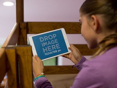 Mockup Featuring a Teen Girl Using an iPad in Landscape Position 13001