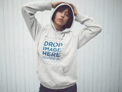 Pullover Hoodie Mockup of a Woman with Short Hair with her Hands on her Head