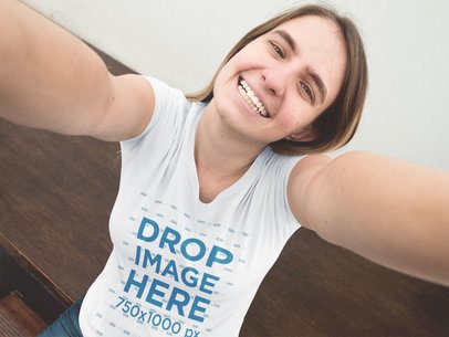 Blonde Young Woman Taking a Selfie and Smiling T-Shirt Mockup