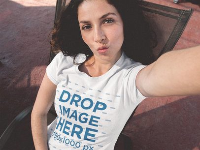 Lovely Girl with Long Curly Hair Taking a Selfie T-Shirt Mockup a12905