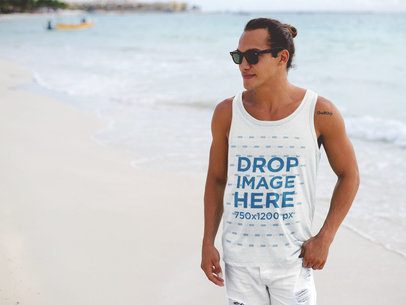 Beach Guy Wearing a Tank Top Mockup with Boardshorts at the Shore
