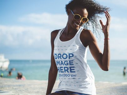Tank Top Mockup of a Woman Flipping Her Hair at the Beach