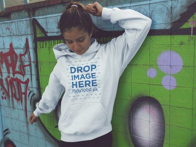 Hoodie Mockup of a Lovely Girl with a Ponytail at a Graffiti Wall a12851