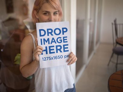 Young Woman With Pink Hair Holding a Magazine Against Her Body Mockup a14372