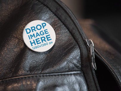Mockup of a Button on a Black Leather Backpack