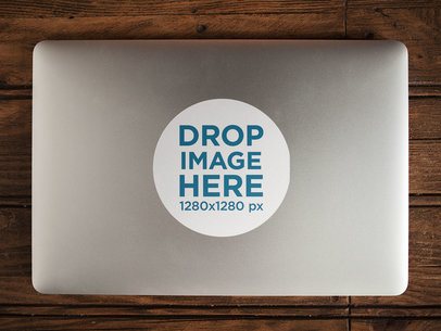 Sticker on Top of a MacBook Mockup