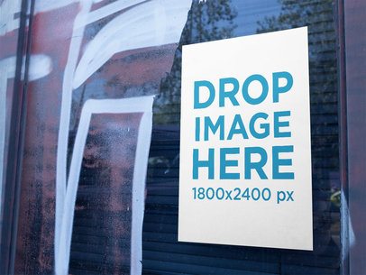 Mockup of a Poster on a Closed Store Window