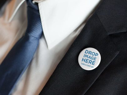 Button on a White Man Black Suit 